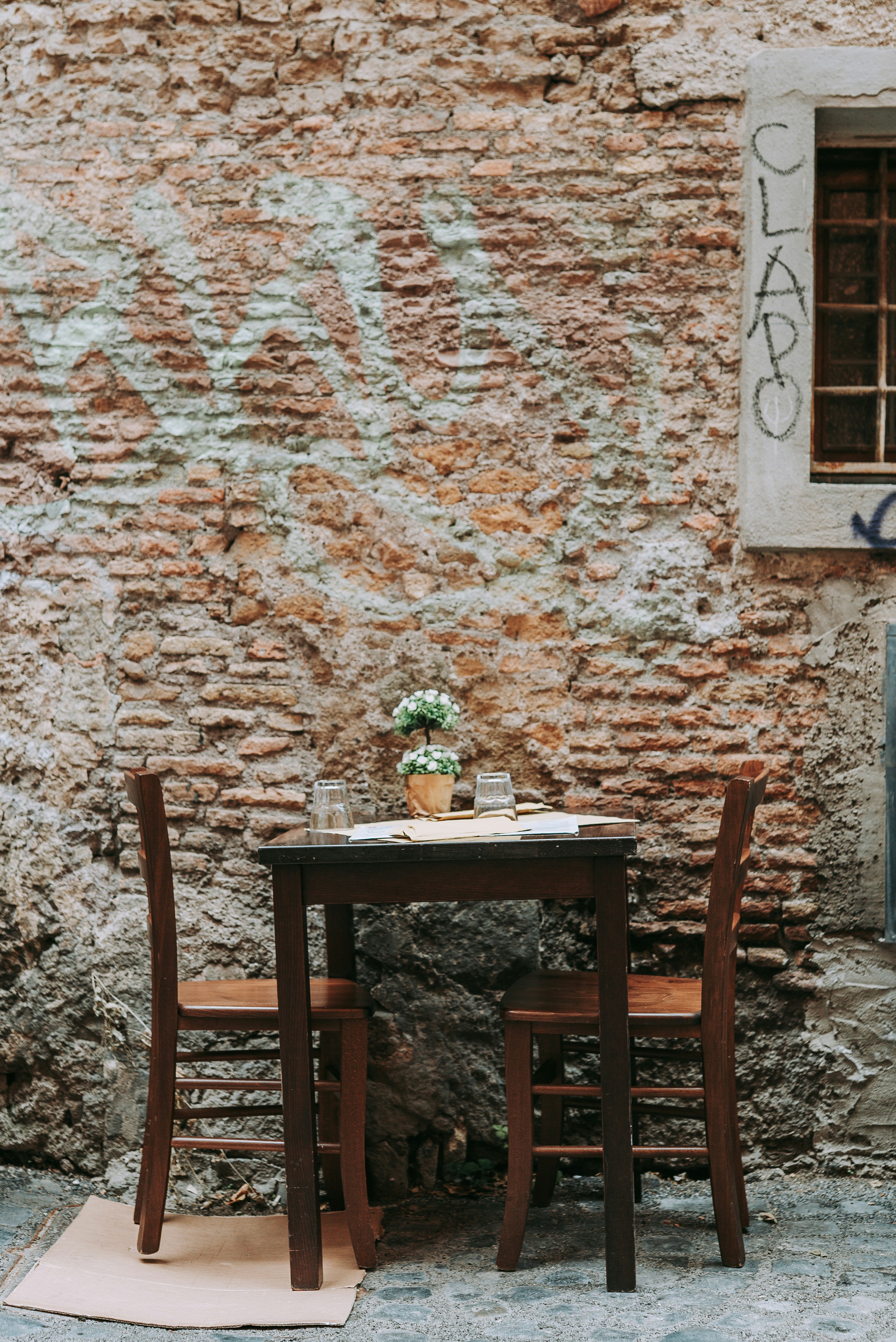 brown wooden table with chairs
