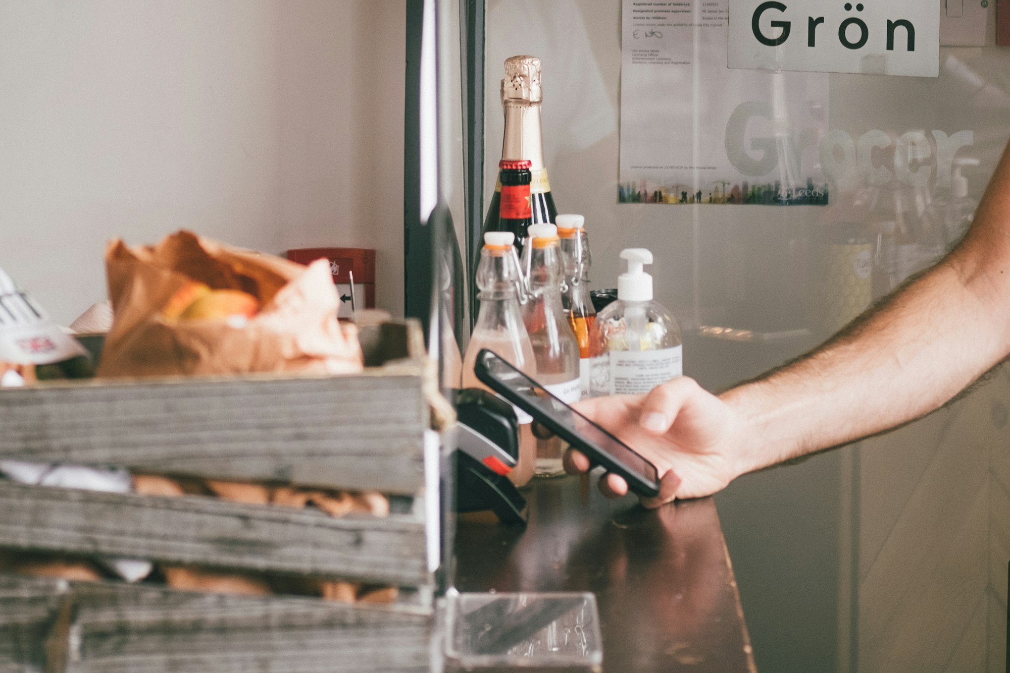 An Apple user making payments using Apple Pay