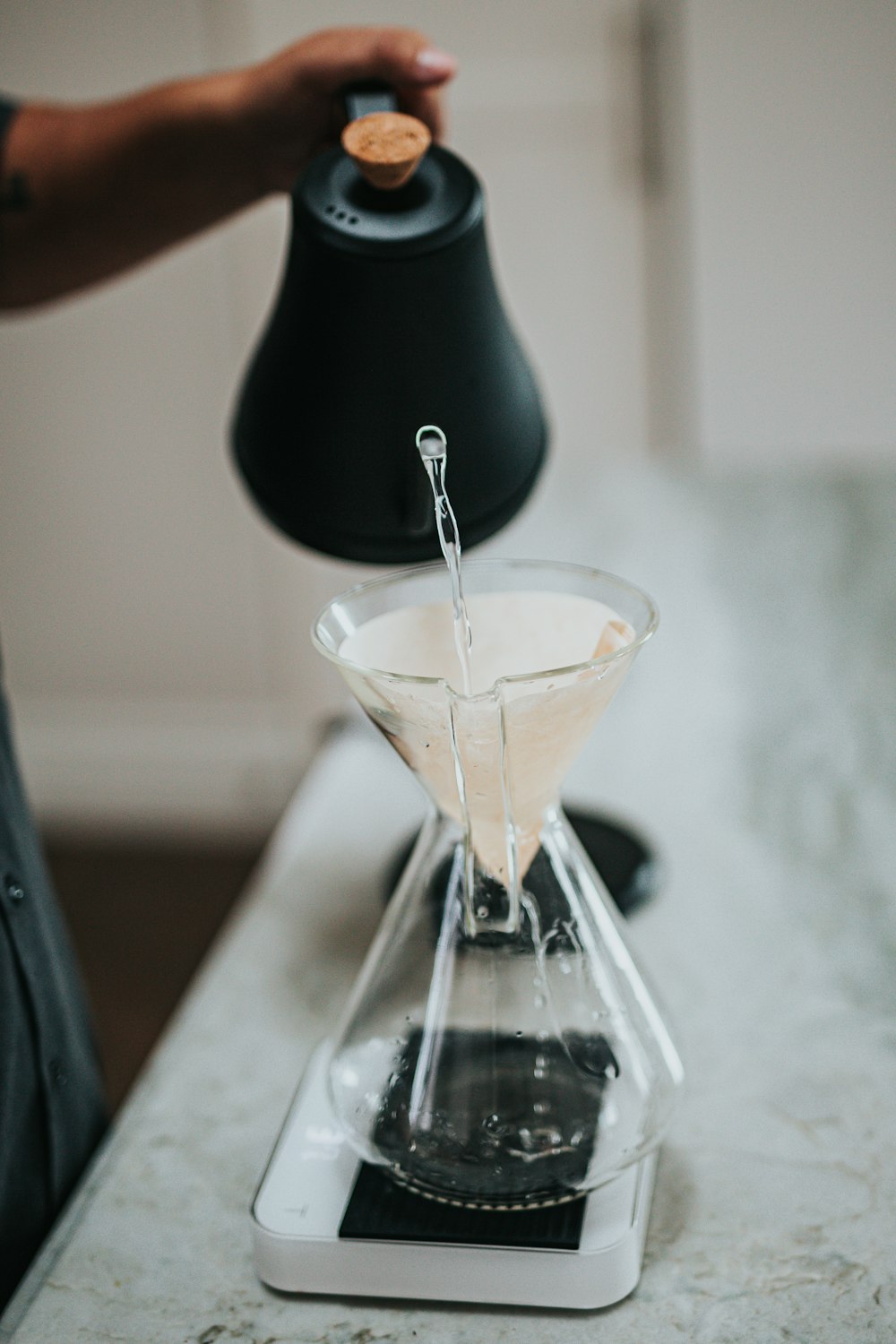 clear glass cup with white liquid