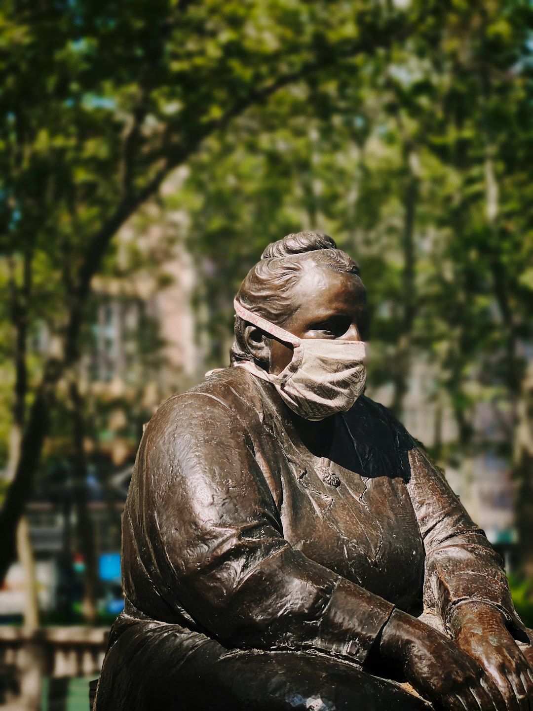 man in black leather jacket statue