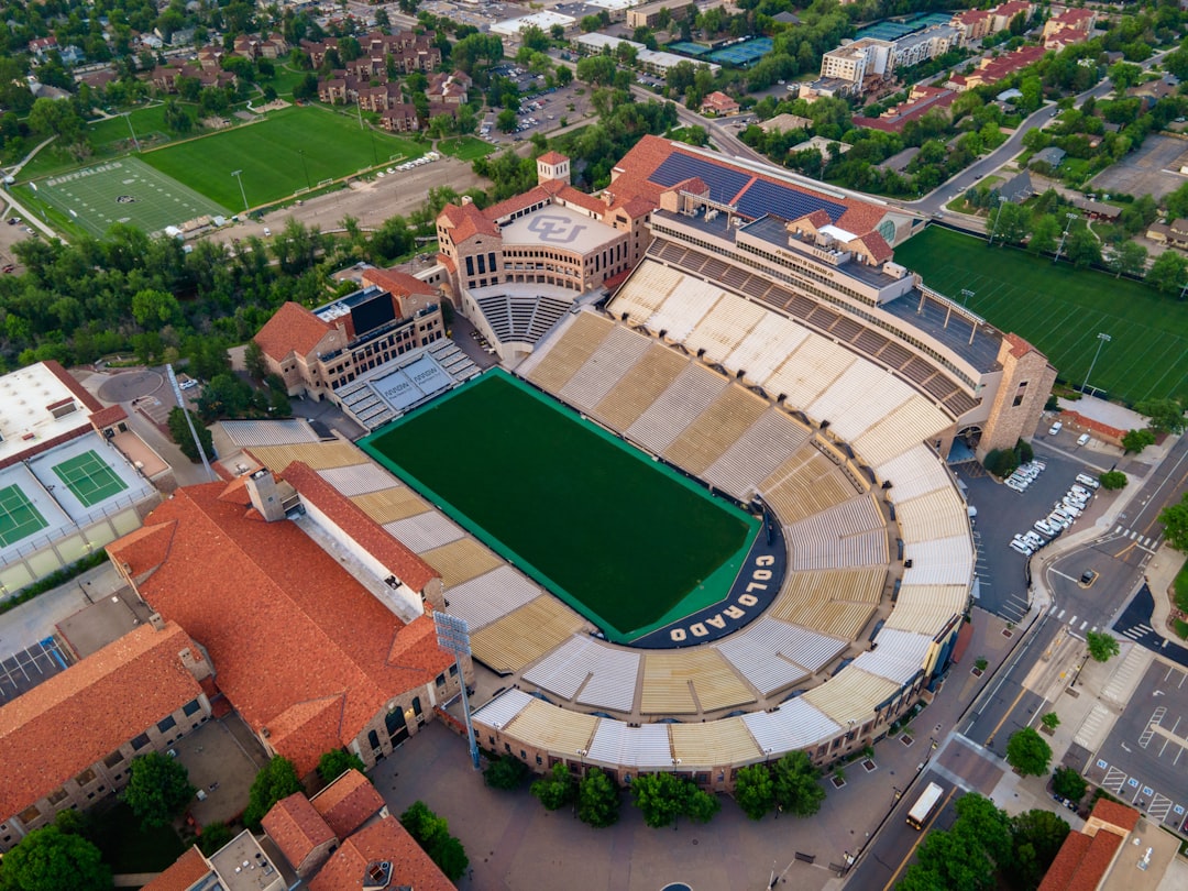 aerial view of green and brown football field