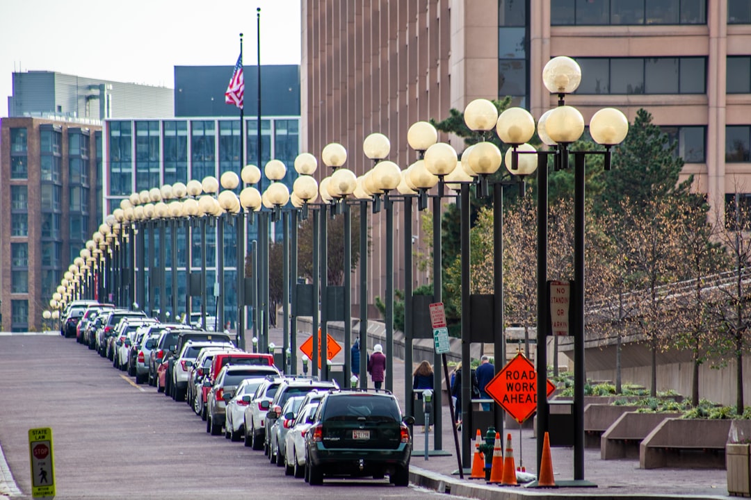 cars parked on parking lot during daytime