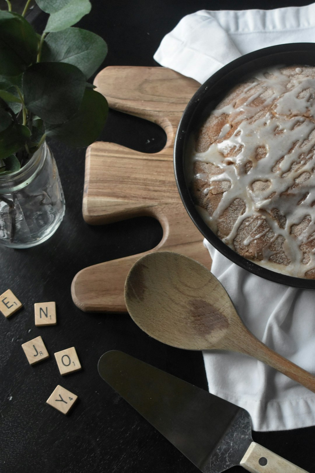 brown wooden ladle on brown wooden ladle