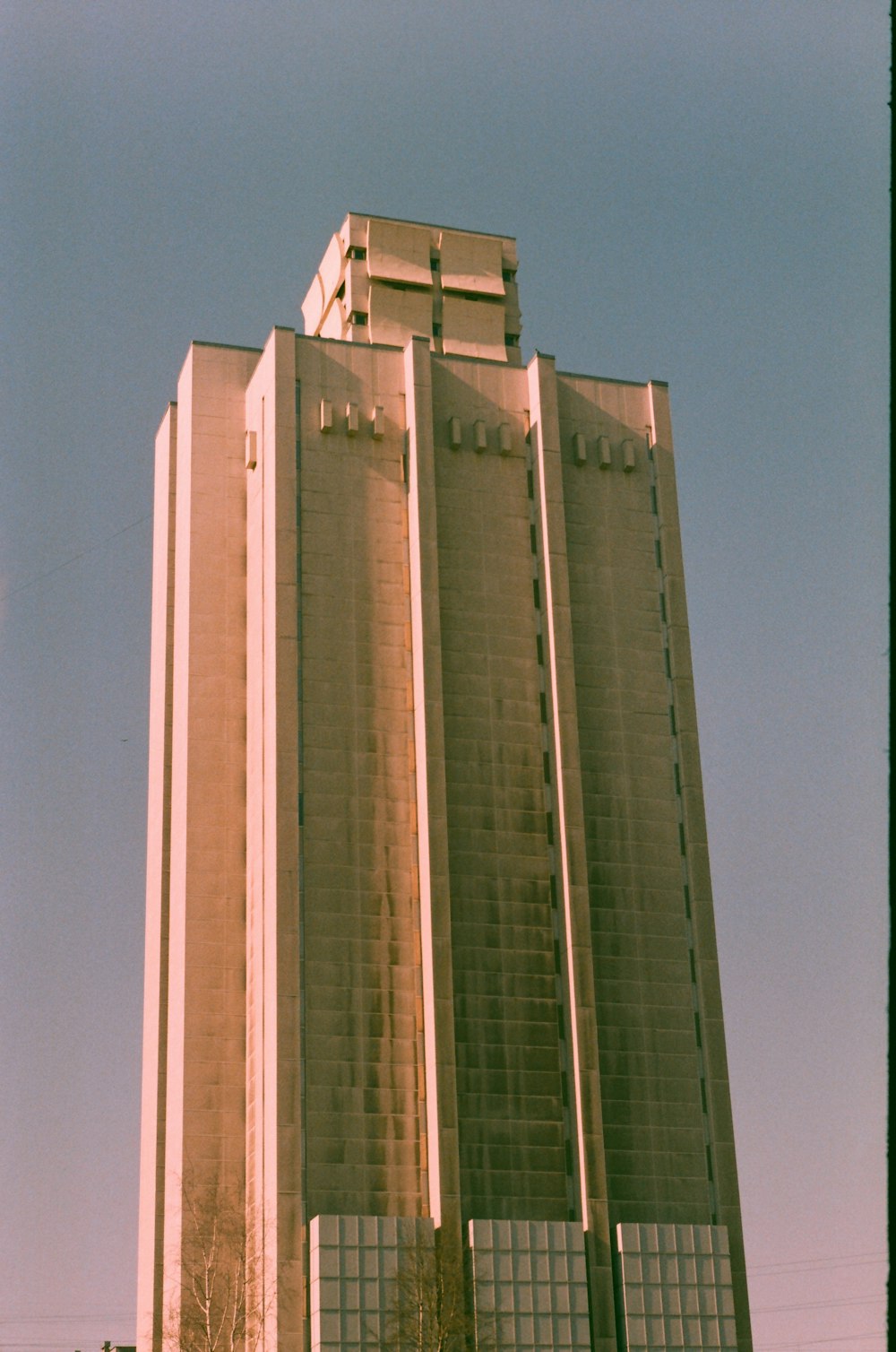 gray concrete building under blue sky during daytime