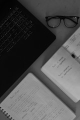 white printer paper on black laptop computer