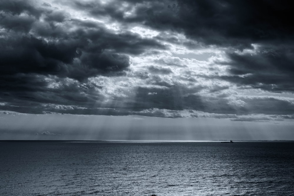ocean under cloudy sky during daytime