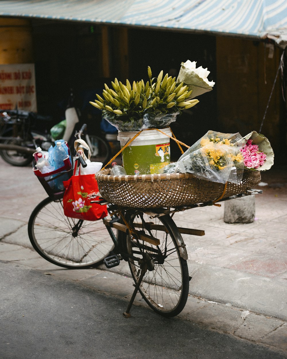 red and black trike with flowers on top