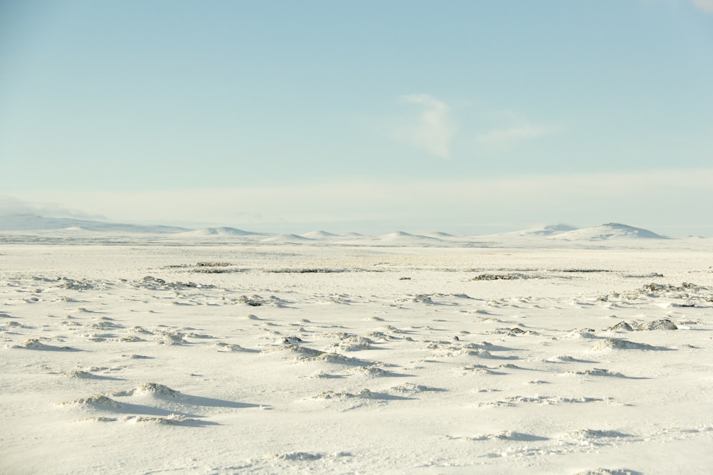 white sand under blue sky during daytime