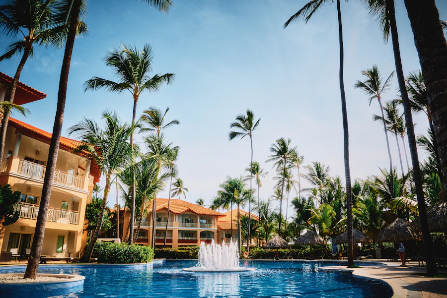 Aerial view of luxury resort infinity pool overlooking Caribbean Sea
