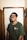 man in green crew neck t-shirt wearing black framed eyeglasses