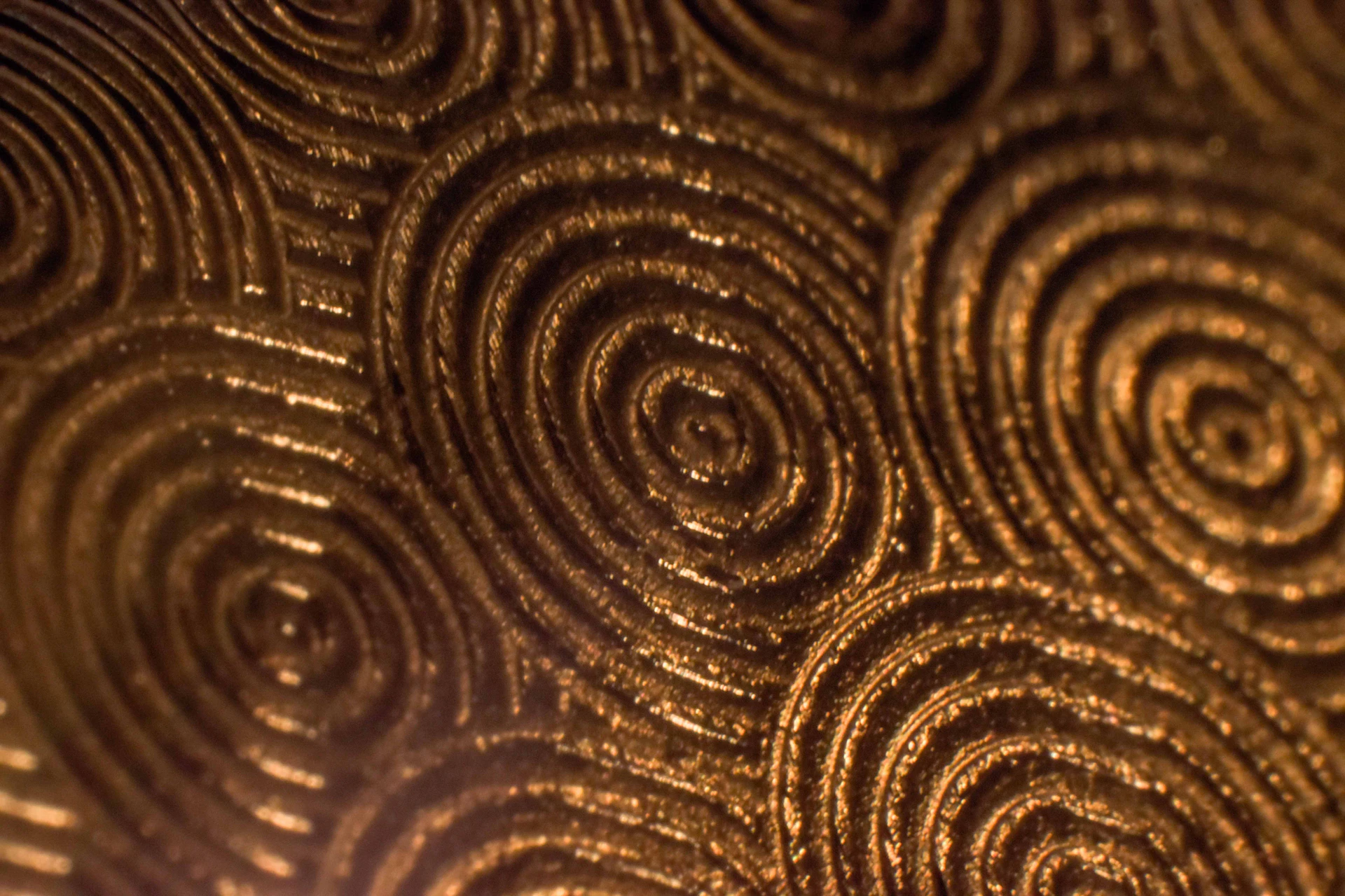 gold and black floral textile