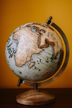 brown and white desk globe