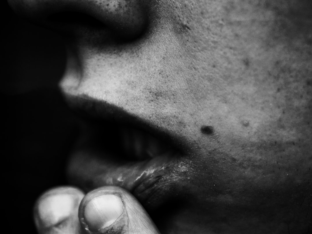 grayscale photo of persons lips