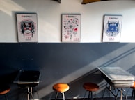 A photo of the educational poster series displayed on a wall, highlighting the approachable design.