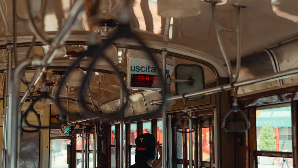 people in train during daytime