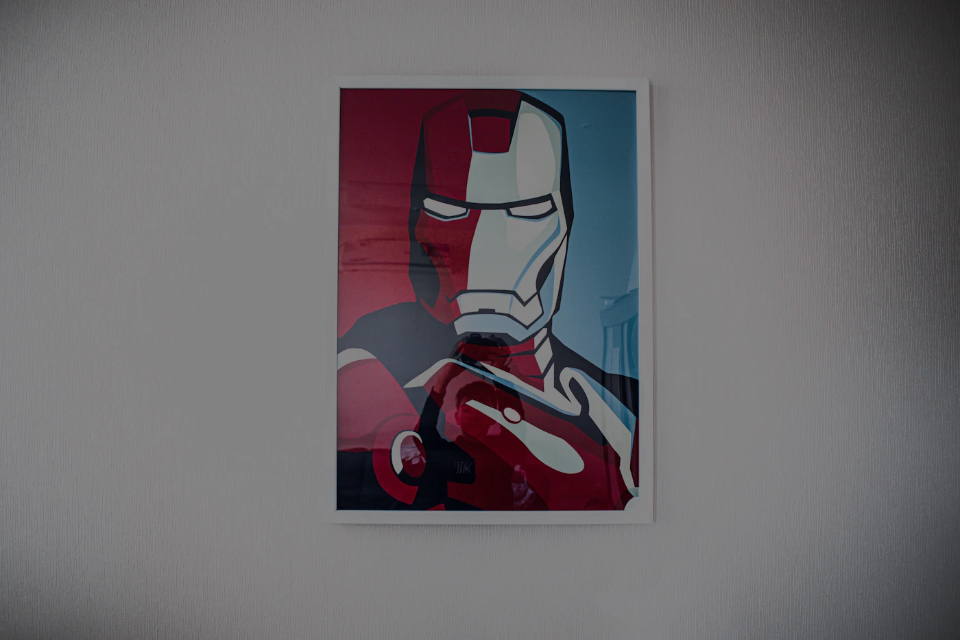 Red and gold comic character artwork on a printed poster