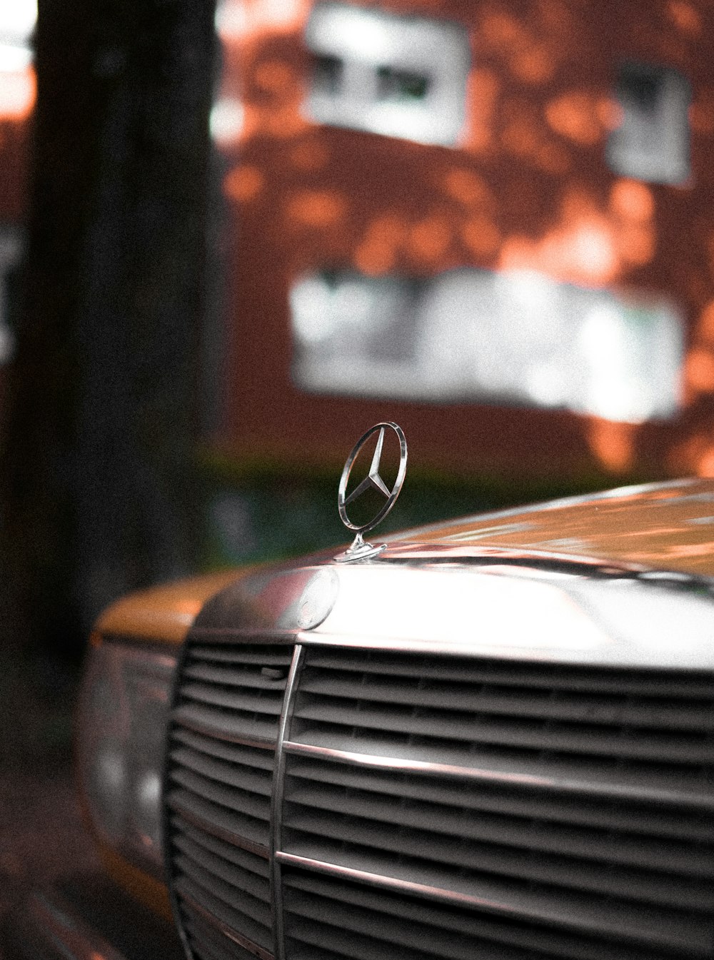 silver car in tilt shift lens