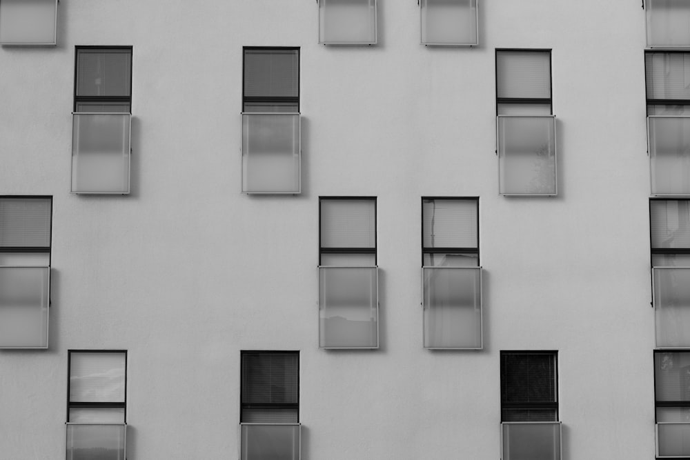 white concrete building with windows
