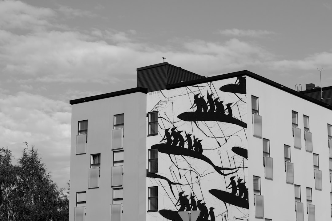 grayscale photo of concrete building