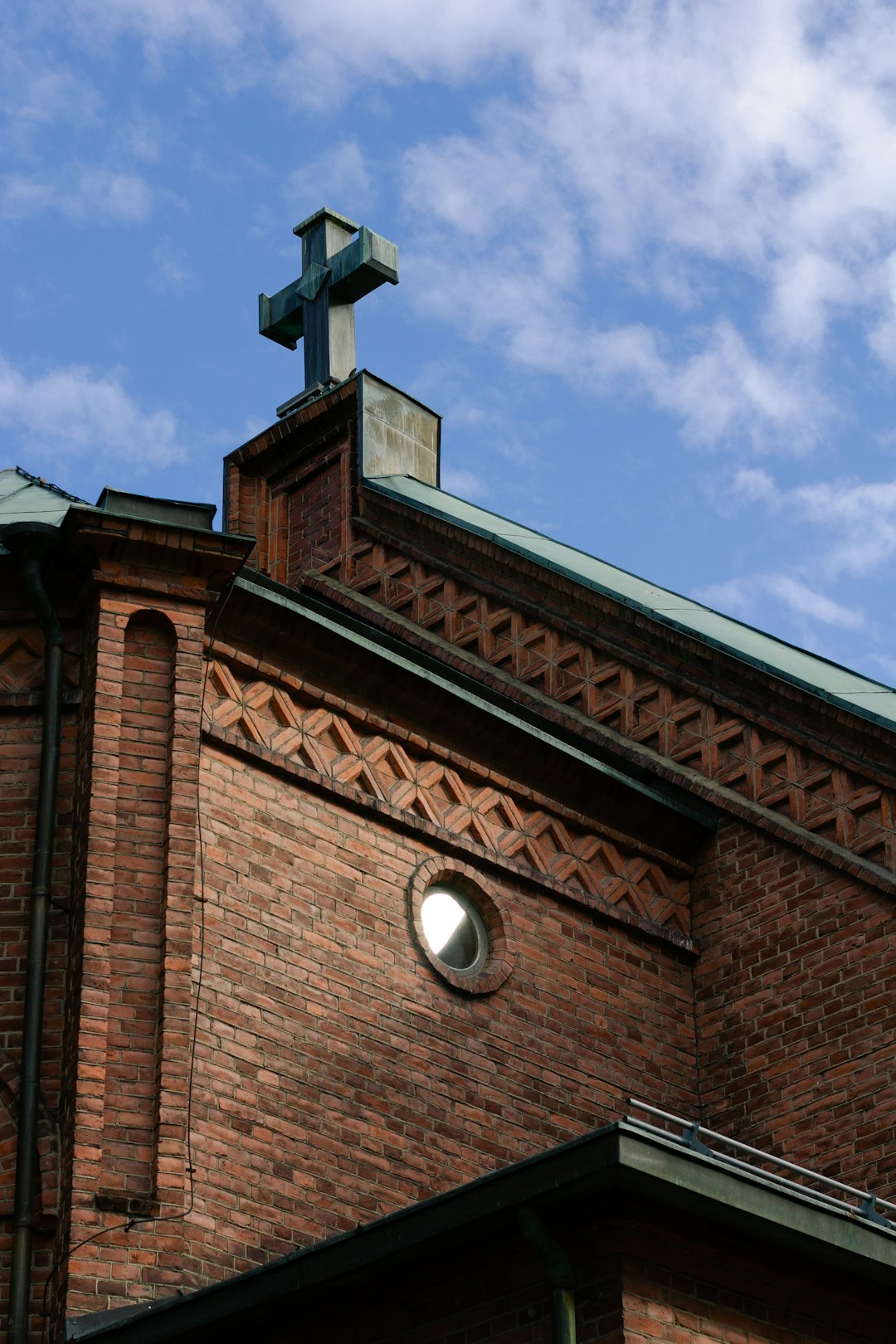 brown brick building under blue sky during daytime