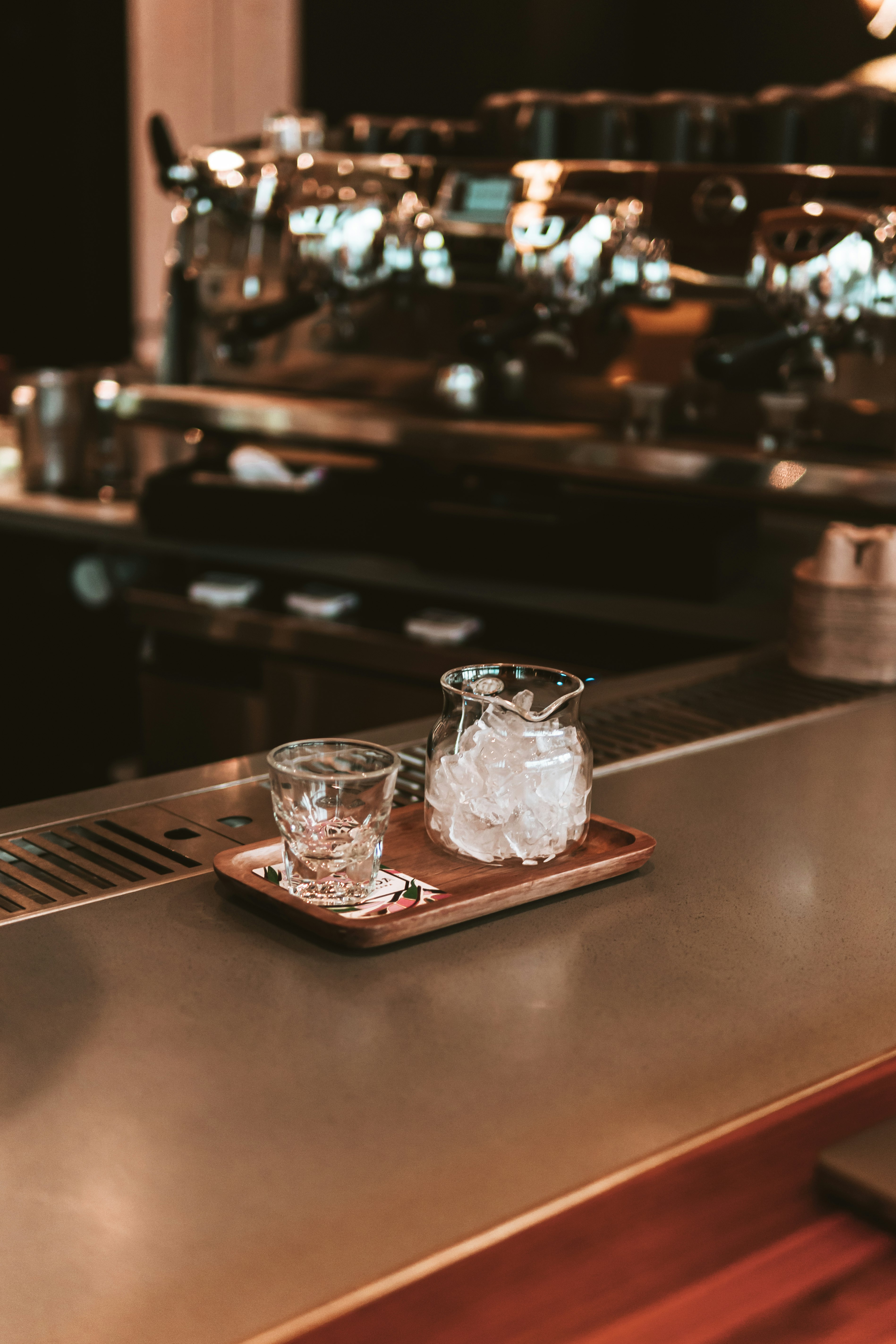 clear drinking glasses on brown wooden table