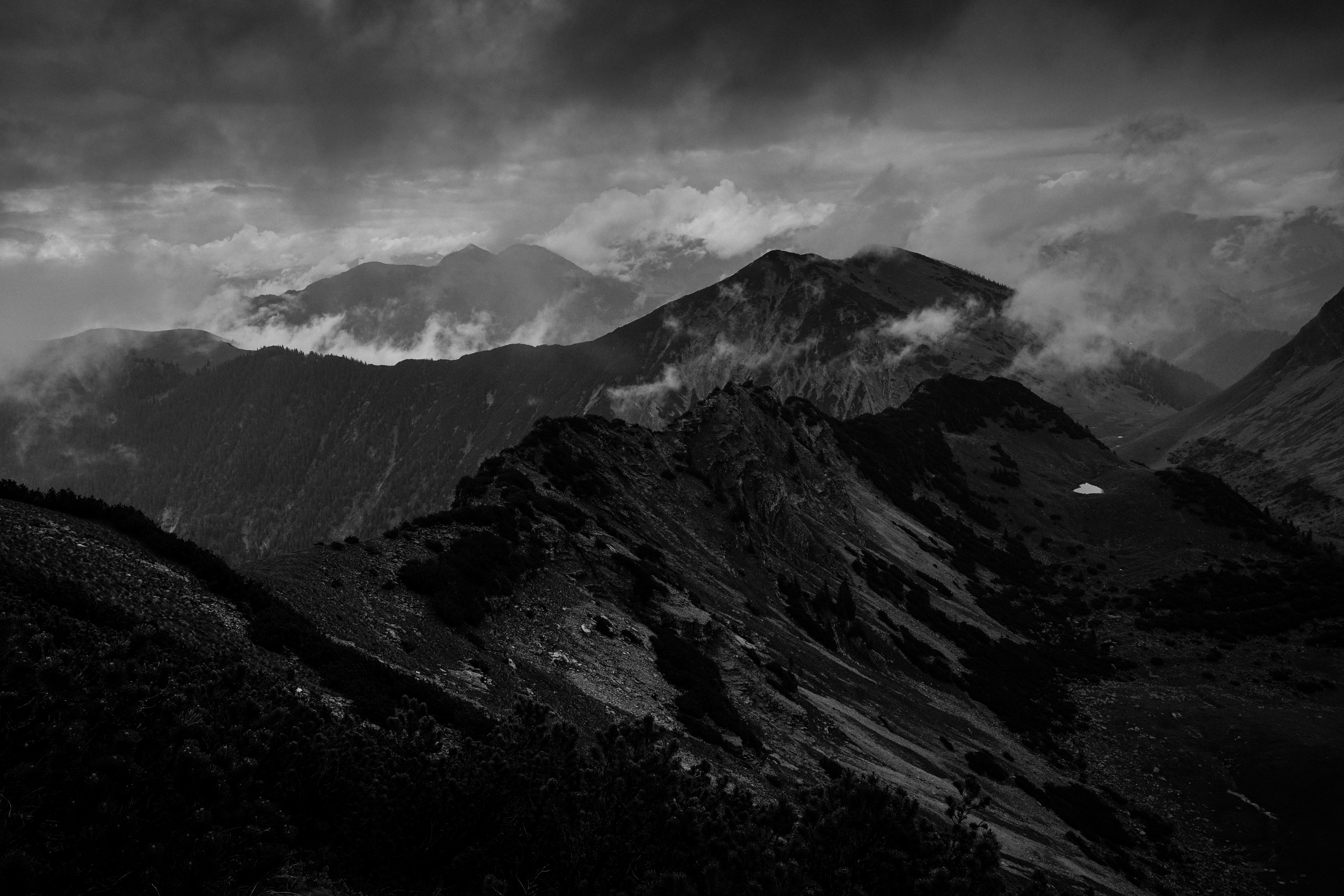grayscale photo of mountain range