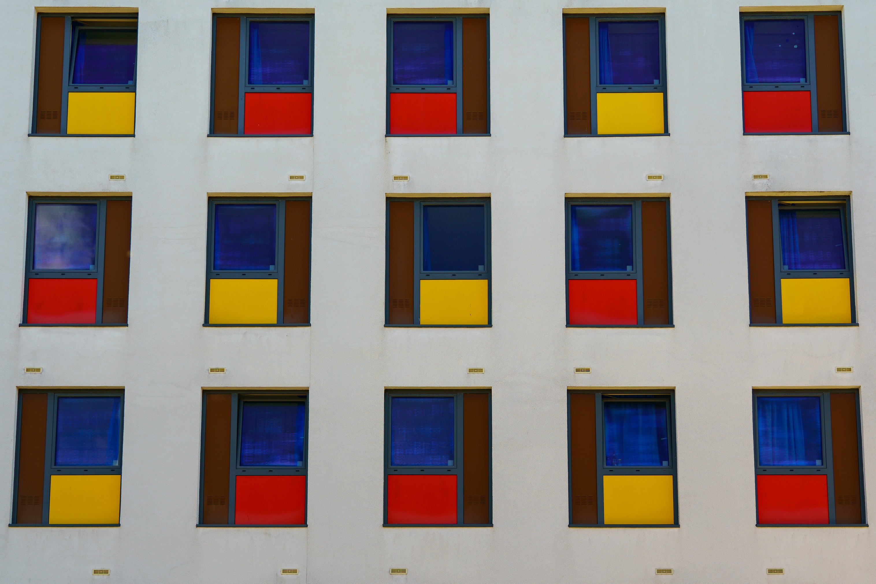 white blue and yellow concrete building