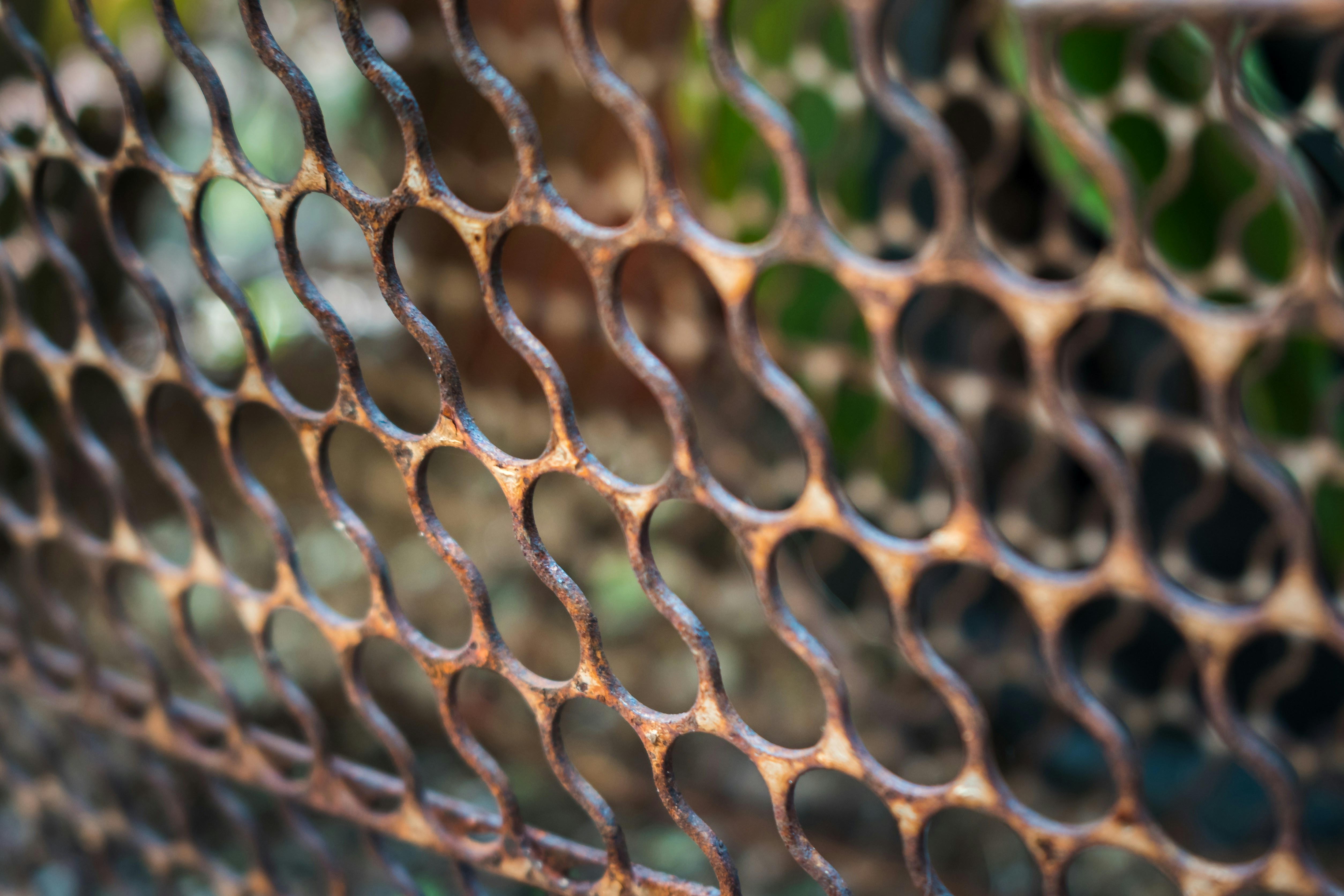 brown metal chain link fence
