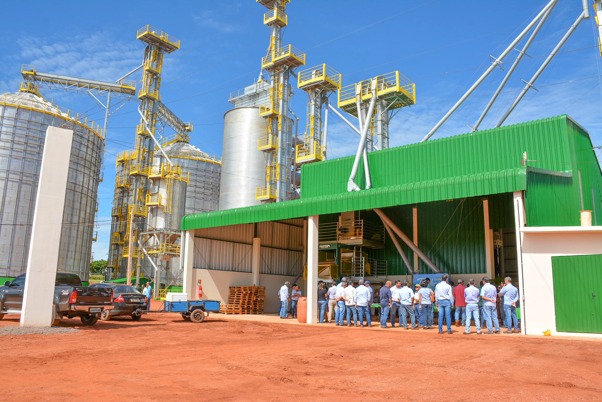 people standing near green and white building during daytime