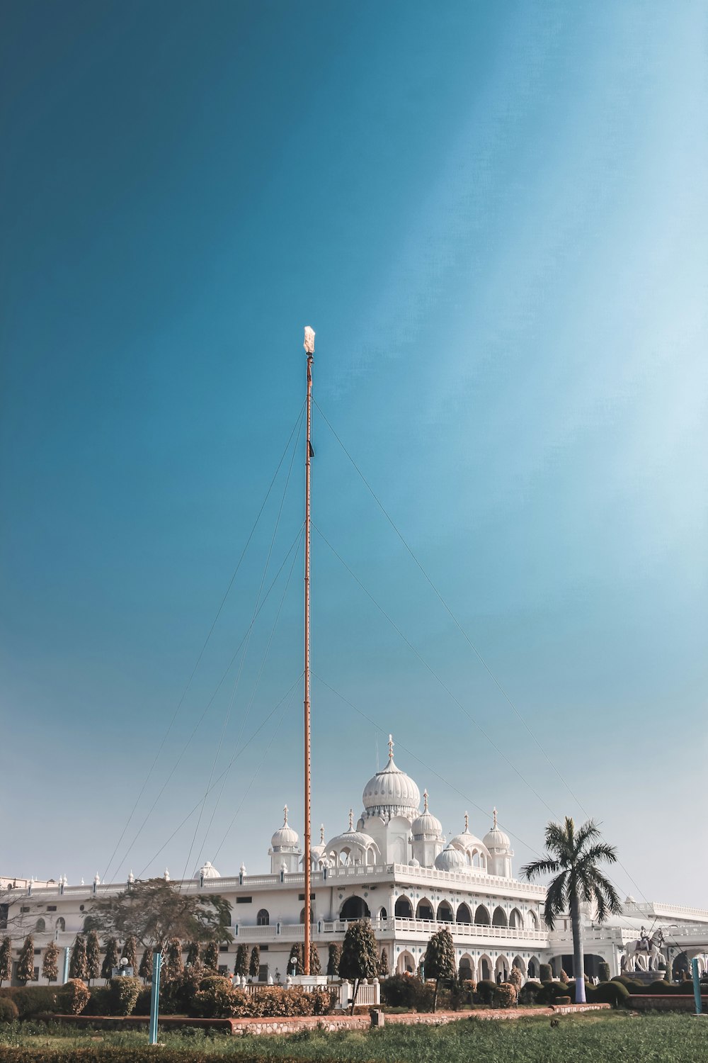 white and brown dome building under blue sky during daytime