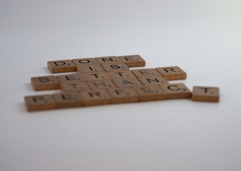 brown wooden blocks on white table