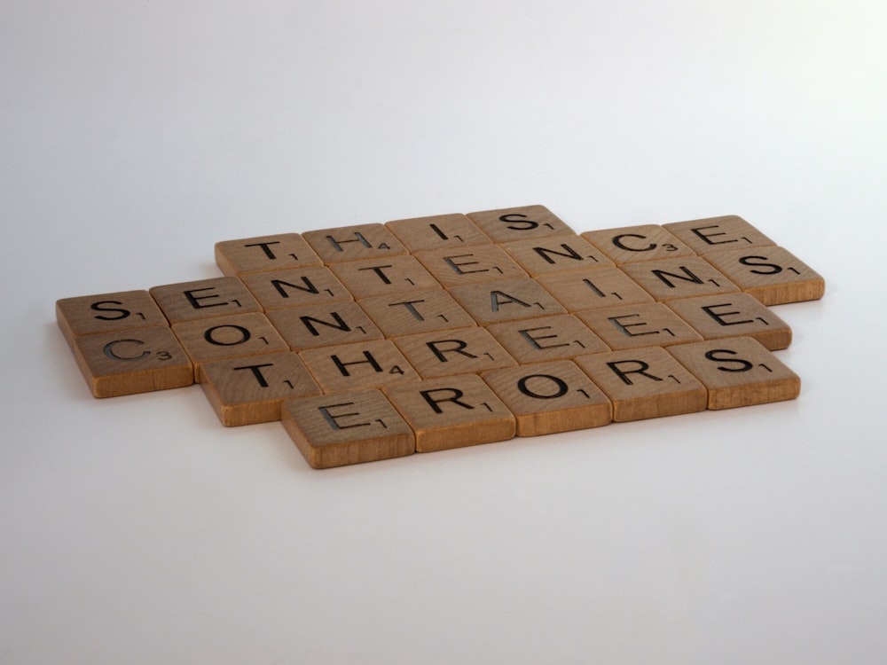 brown wooden blocks on white table