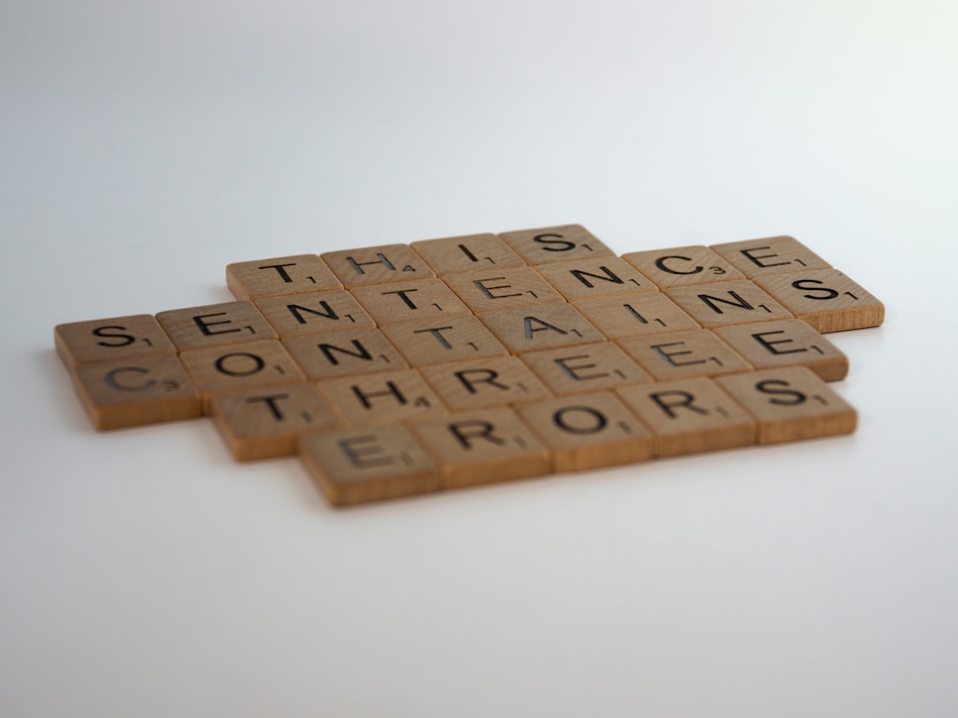 scrabble, scrabble pieces, lettering, letters, white background, wood, scrabble tiles, wood, words, 
this sentence contains three errors, puzzle, riddle, humour, conundrum, quiz, 
