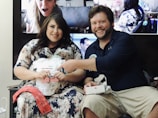 A happy couple preparing for their baby's arrival.