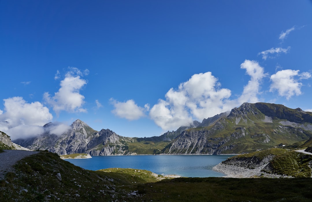 green and white mountains under blue sky during daytime