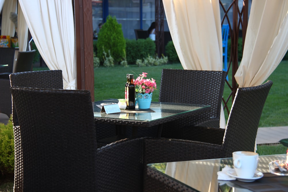 black wooden table with chairs