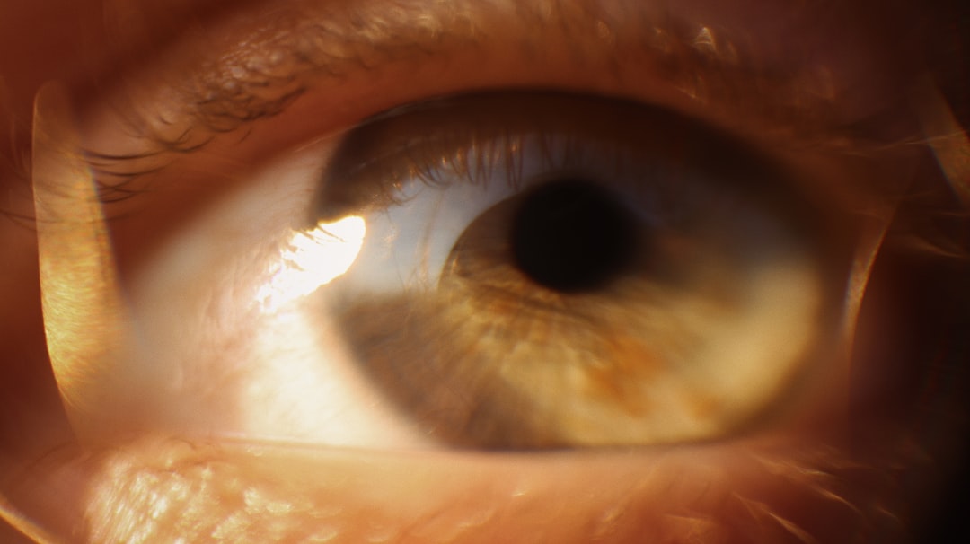 persons eye in close up photography