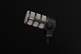 black and gray microphone with stand