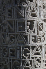 Close-up of intricate Viking runes blending seamlessly with ancient Egyptian hieroglyphs carved into stone.