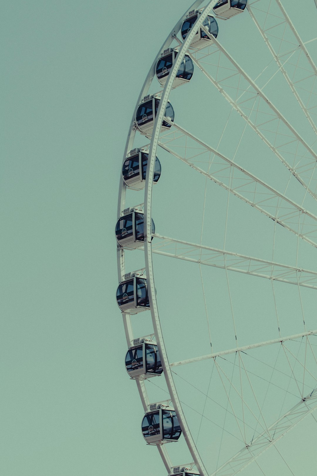 white ferris wheel under blue sky during daytime