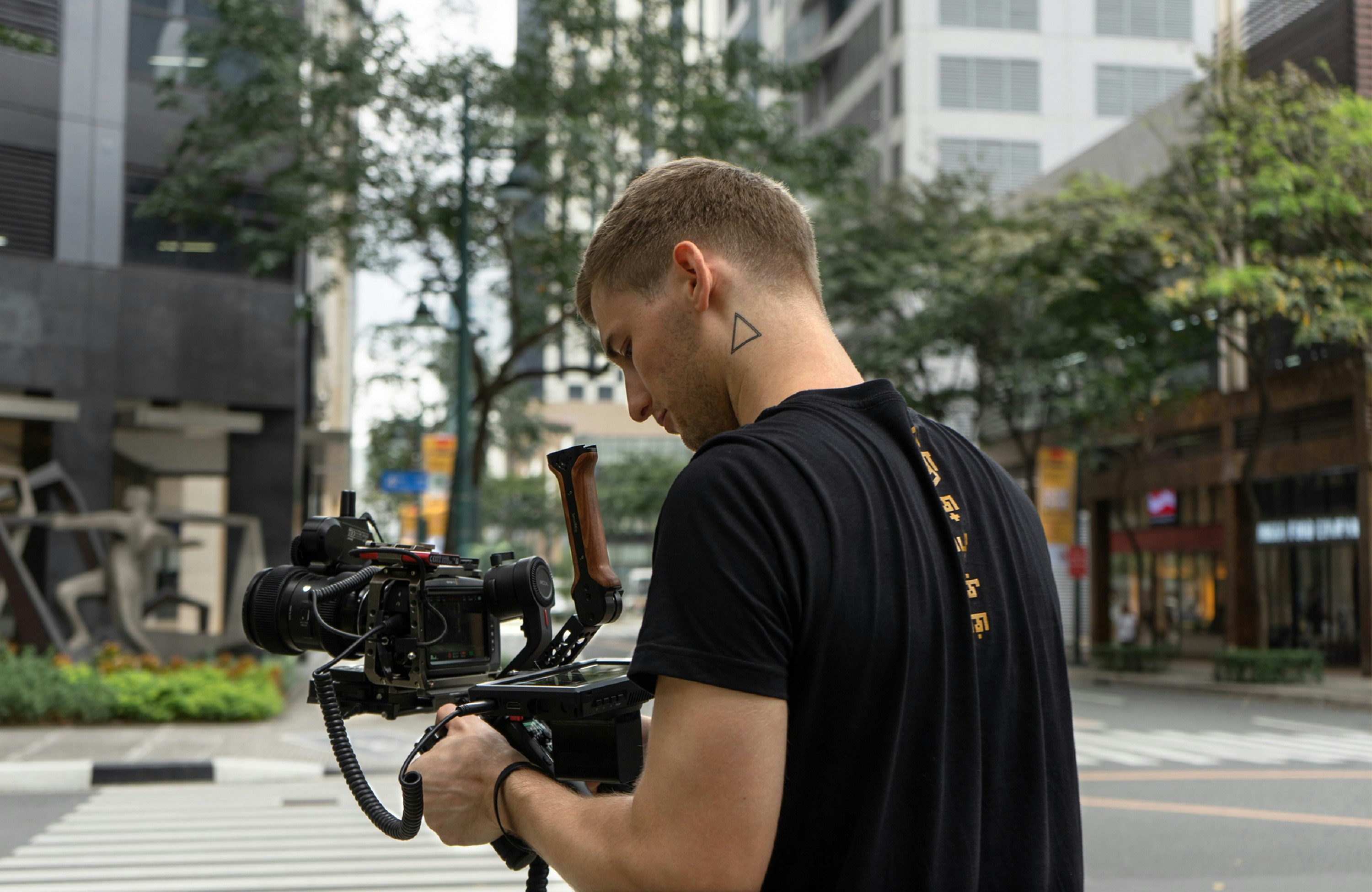 A filmmaker referencing a storyboard on set