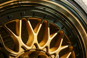 Detailed shot of Kronos Bearings with a metallic black and electric blue finish