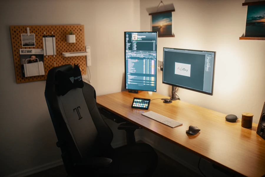Monitor mounted on a desk arm, angled for ergonomic viewing