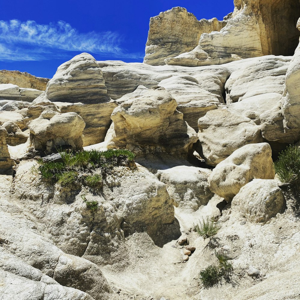 rocky mountain under blue sky during daytime