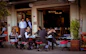 people sitting on chairs in restaurant