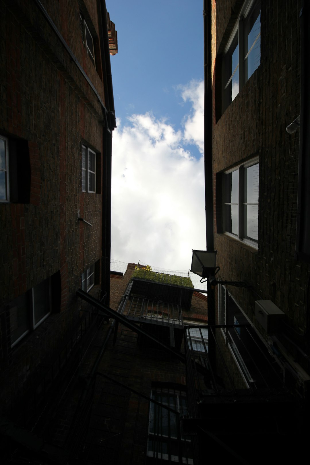 brown concrete building under blue sky during daytime