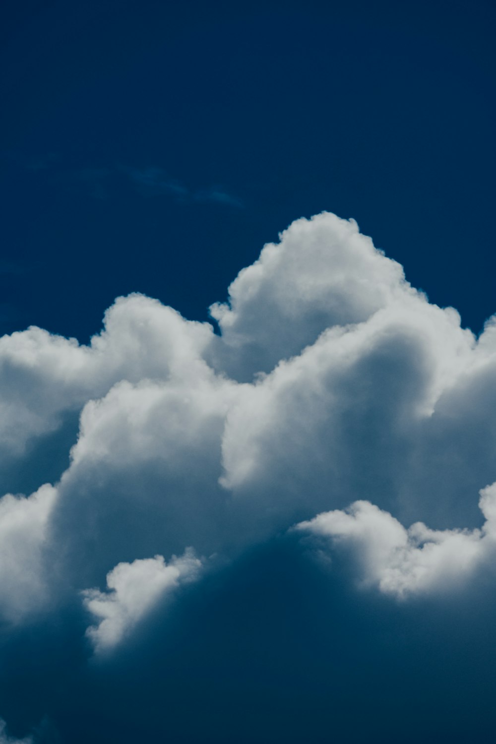 white clouds on blue sky