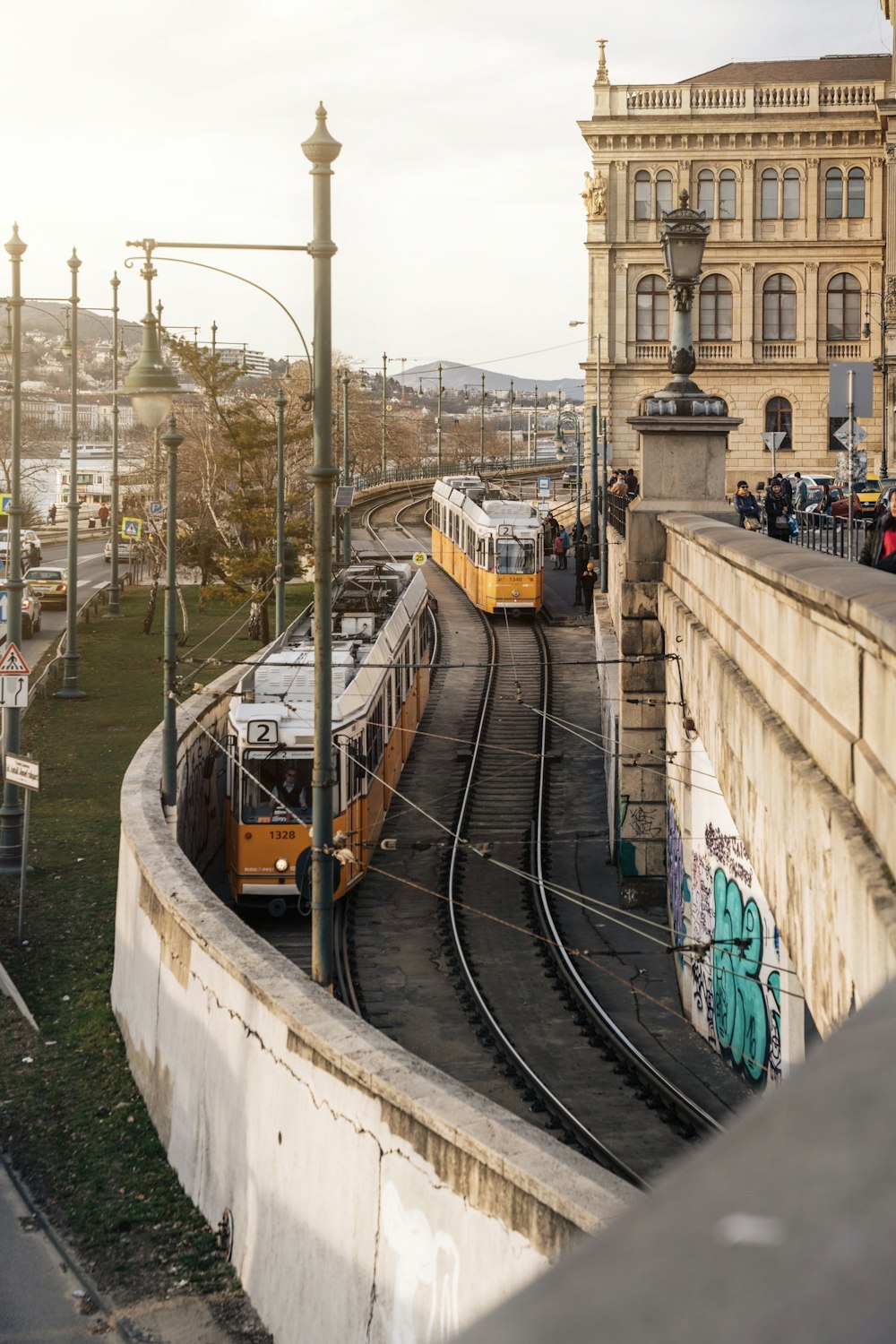 brown and green train on rail road during daytime