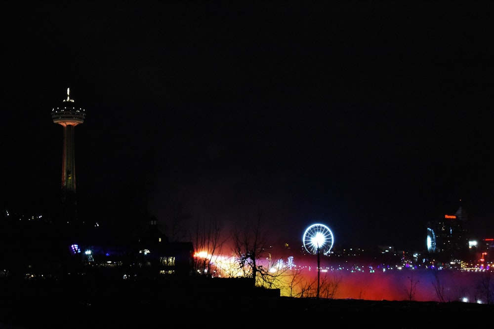 lighted ferris wheel during night time