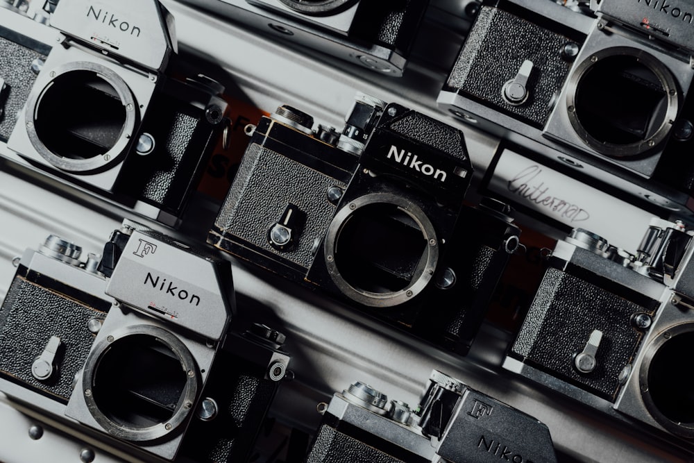 black and silver nikon camera